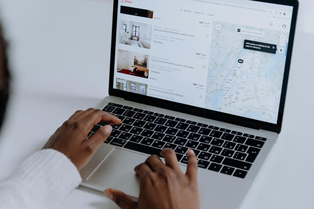 "Laptop displaying a virtual receptionist interface.- benefits of a virtual receptionist