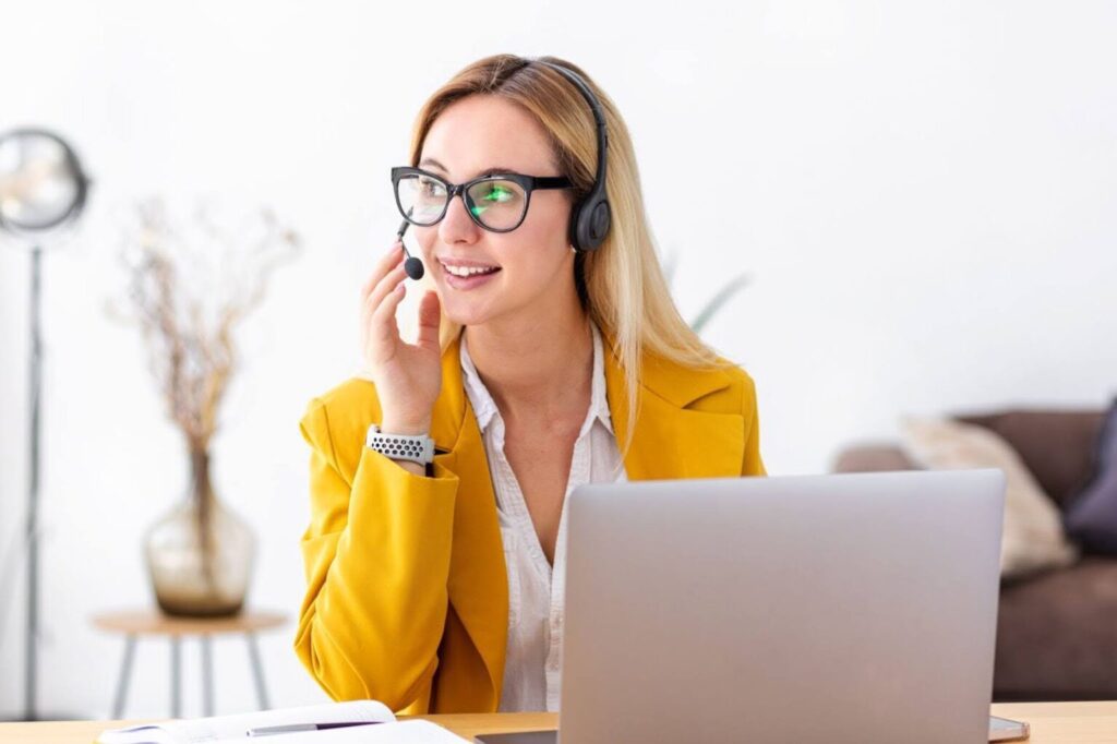 Professional representing virtual receptionists in a tech setting.