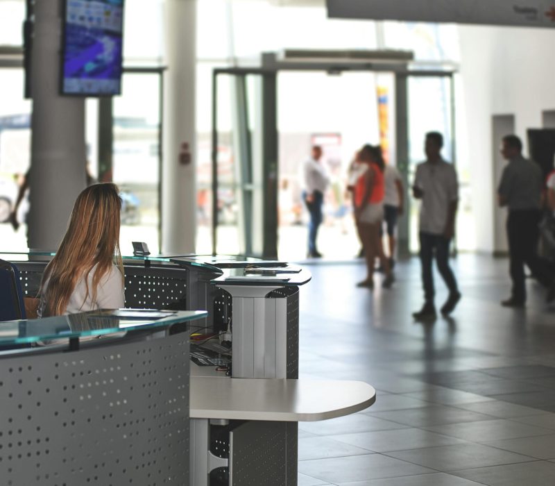 Modern front desk setup illustrating the role of virtual receptionists.- virtual receptionist appointment scheduling